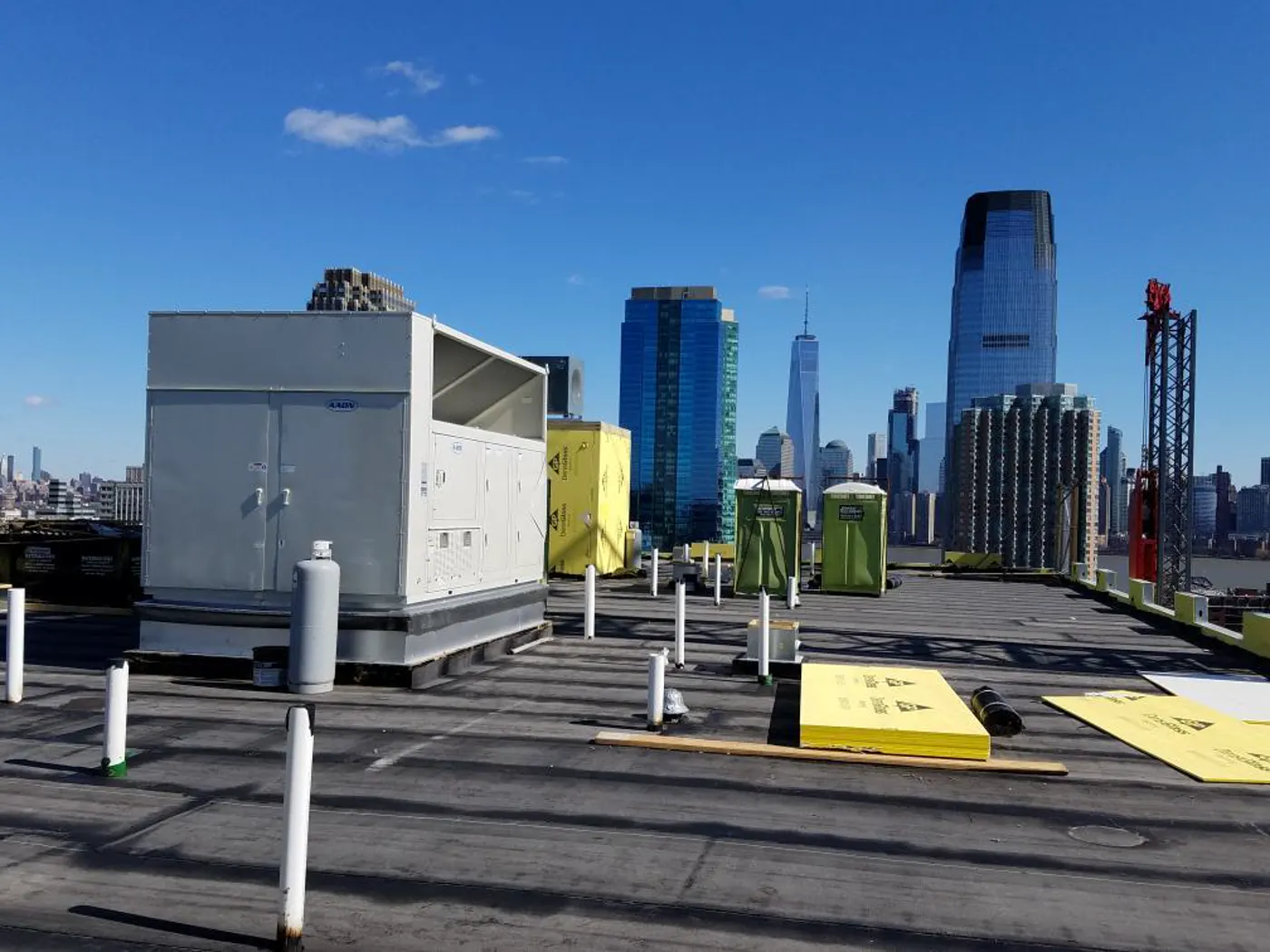 Rooftop install with the Jersey City skyline behind
